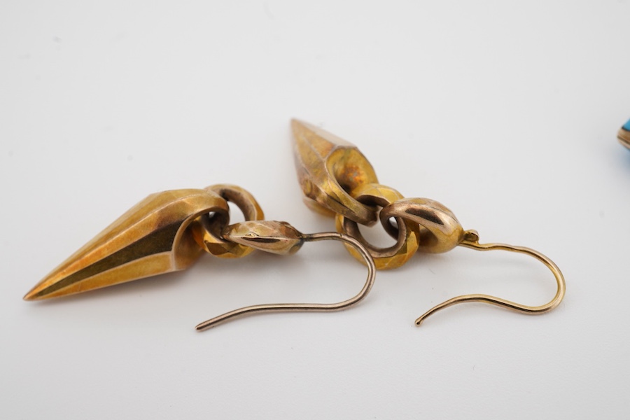 A pair of Victorian yellow metal drop earrings, 32mm excluding ear wire, together with a blue enamel and seed pearl set heart shaped locket(chip). Condition - poor